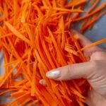 Peeled and trimmed carrots ready for shredding