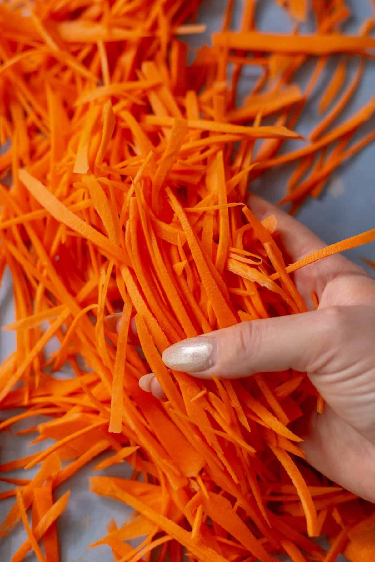 Peeled and trimmed carrots ready for shredding
