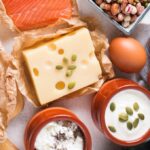 Foods high in the essential nutrient choline, including poultry, beef, cottage cheese, yogurt, eggs, beans, and cruciferous vegetables like broccoli.