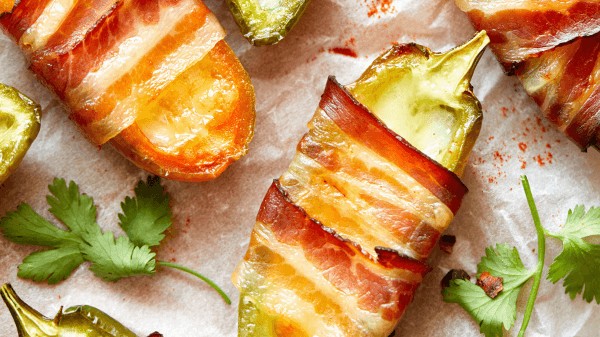Irresistible bacon-wrapped jalapeño poppers, a fiery partner for tamales