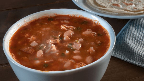 Smoky charro beans, a hearty and flavorful side for tamales