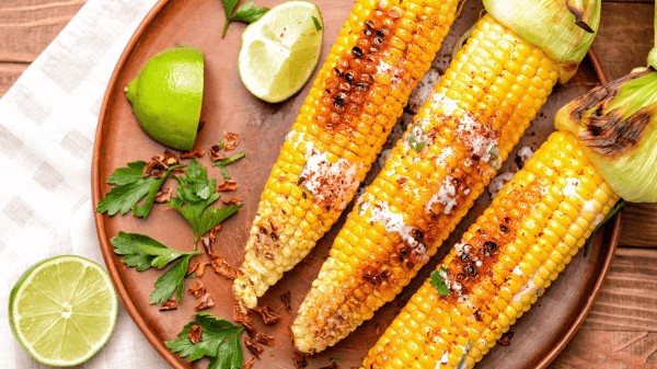 Smoky grilled corn, a sweet and savory side for tamales