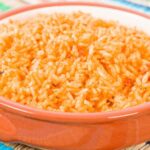Vibrant Spanish rice, a perfect match for savory tamales