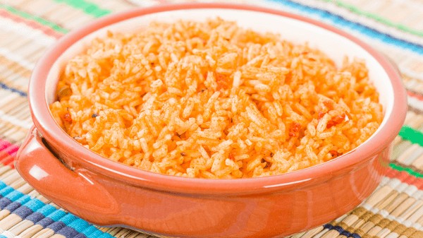 Vibrant Spanish rice, a perfect match for savory tamales