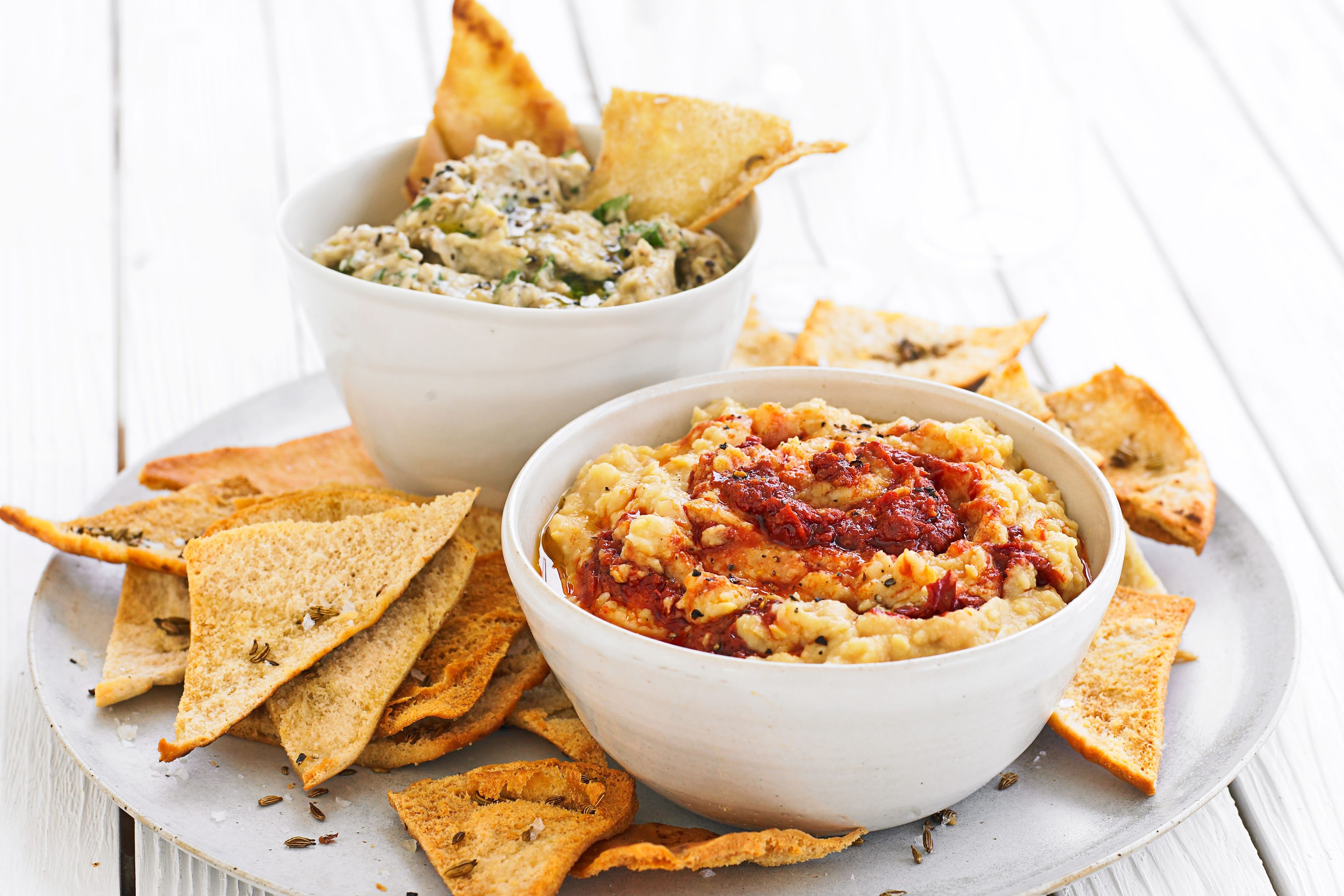 Aubergine dip with paprika, served with nachos, a delicious Moroccan appetizer.