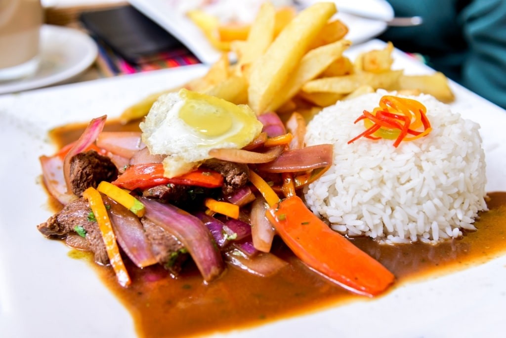 Lomo Saltado served with rice