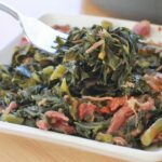 Fresh collard greens being prepared for cooking