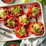Delicious vegetarian stuffed peppers on a baking sheet