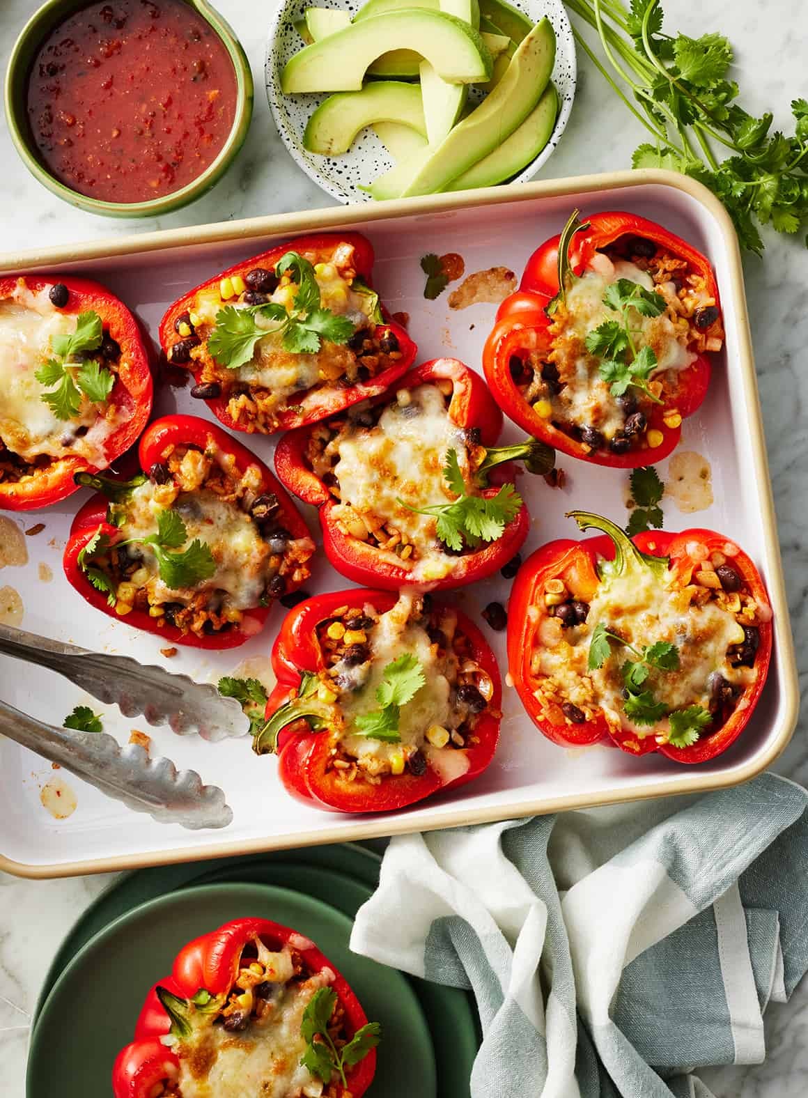 Delicious vegetarian stuffed peppers on a baking sheet