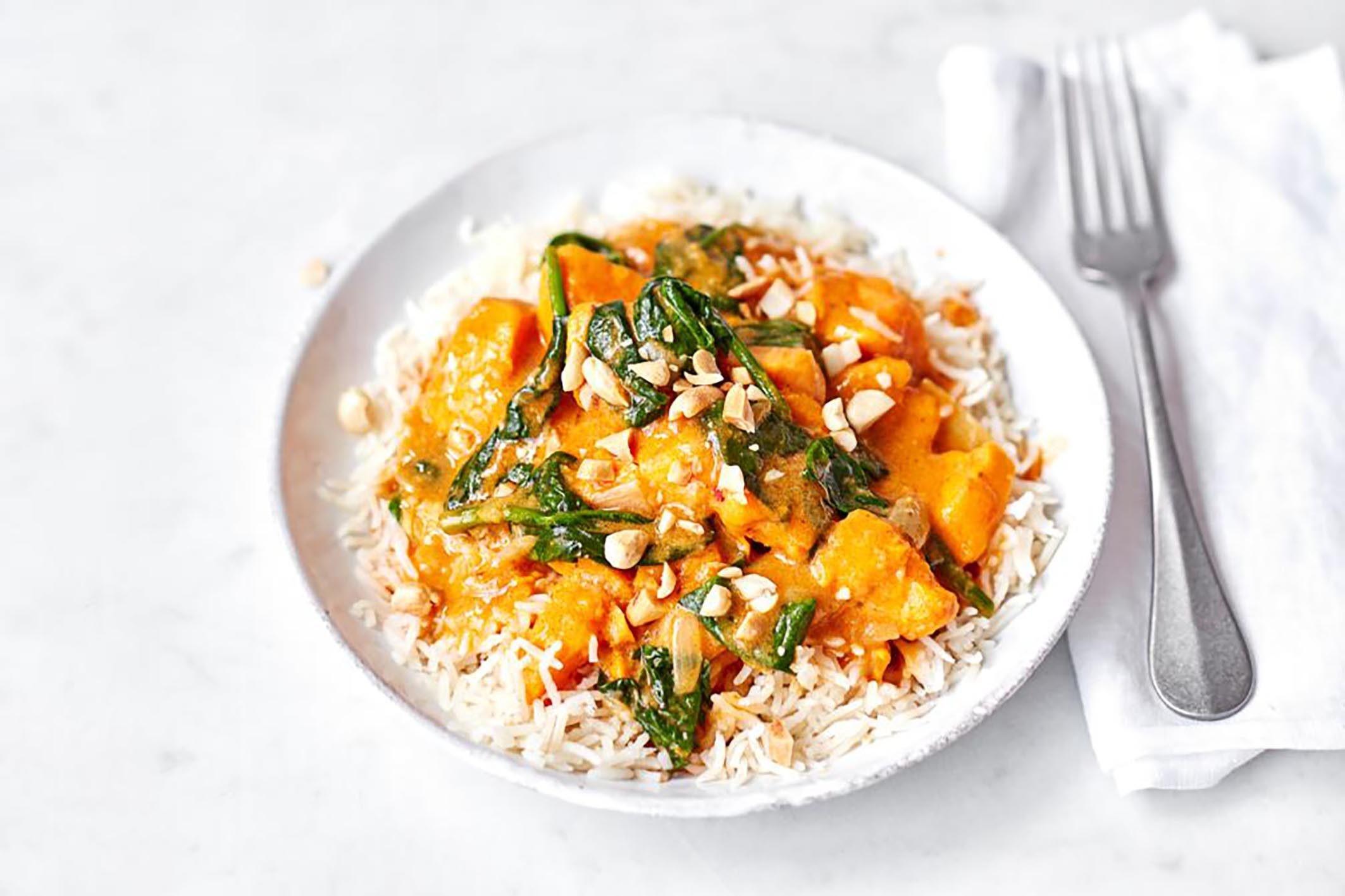 Sweet potato and peanut curry served on white rice