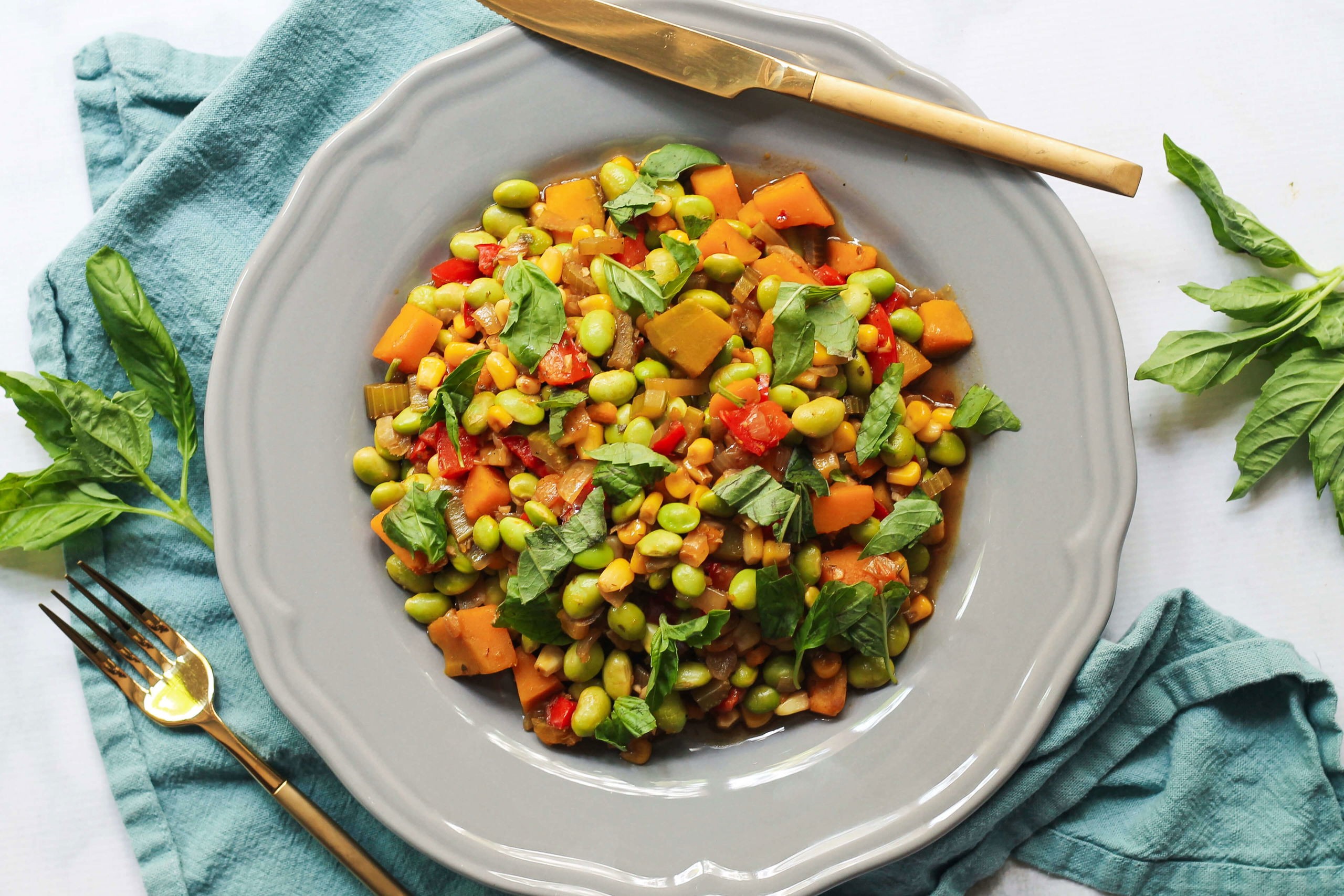 Three Sisters Succotash: A harmonious blend of corn, beans, and squash, showcasing the ingenuity of Native American agriculture and culinary traditions.