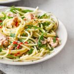 Canned tuna with lemon and herbs, showcasing its versatility and nutritional value