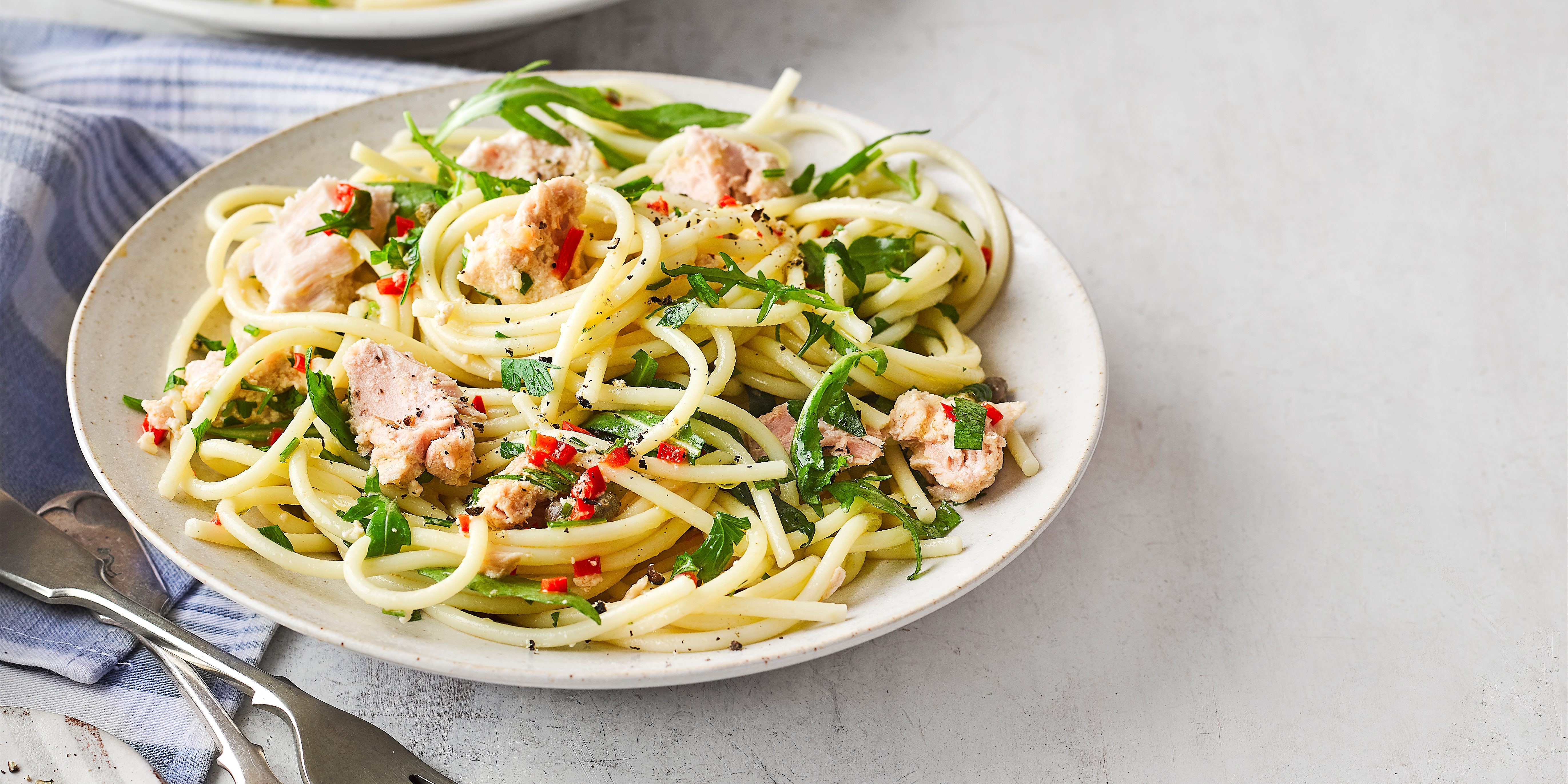 Canned tuna with lemon and herbs, showcasing its versatility and nutritional value