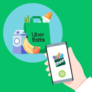 Close-up of hands using the Uber Eats app on a smartphone, showcasing the ease of ordering food online