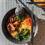 Bowl of ramen with chopsticks on the side
