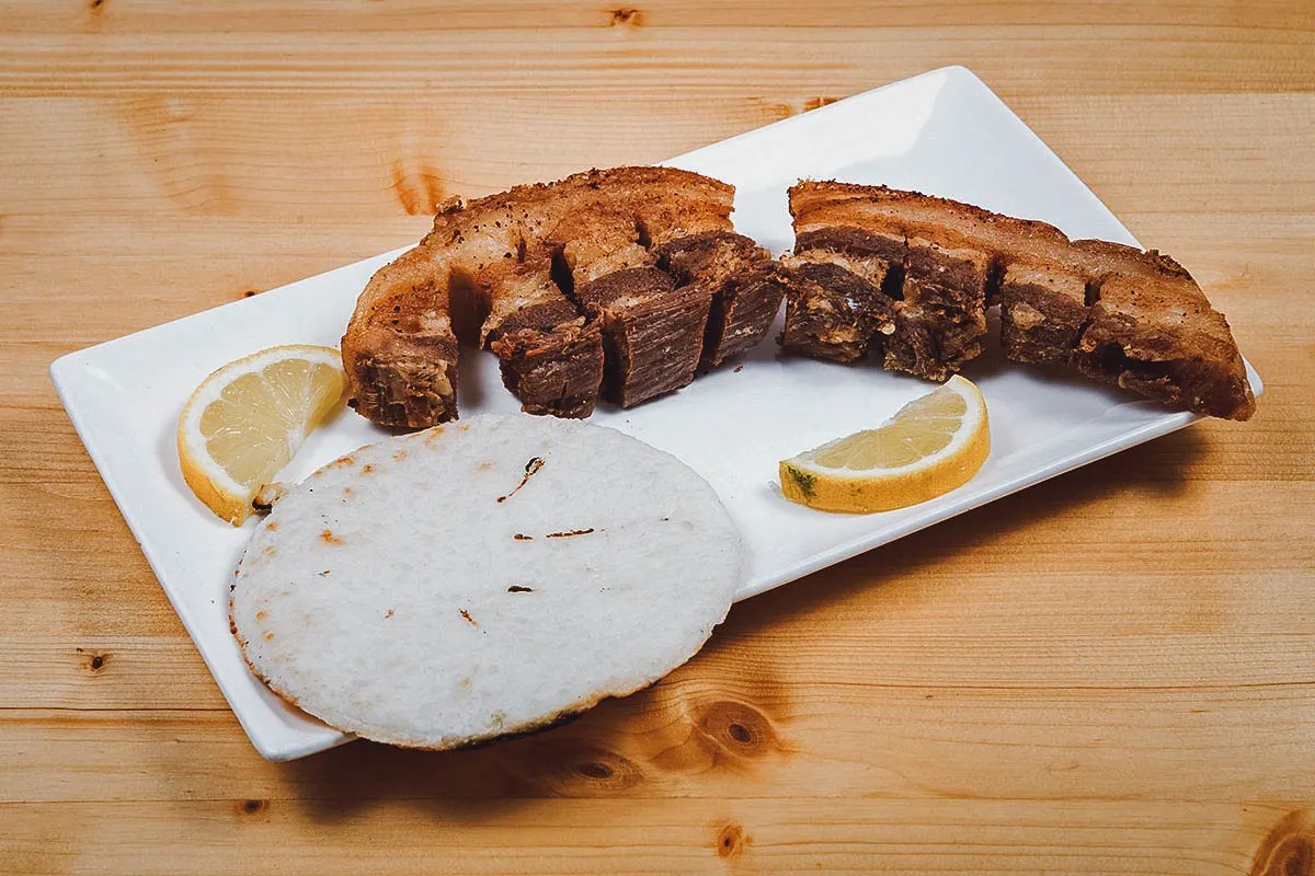 A plate of crispy Chicharron, ready to be enjoyed as a snack or side dish