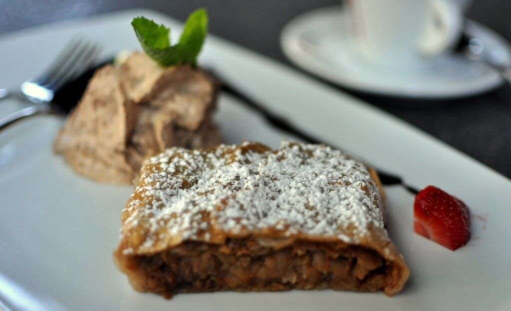 Viennese Apfelstrudel: A must-try Austrian dessert with flaky pastry and spiced apple filling.