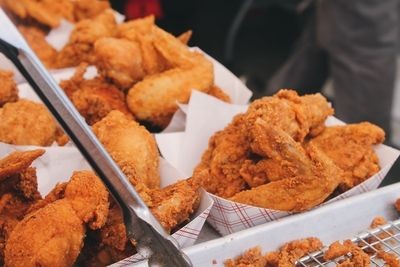 A close-up shot of Hooters' classic wings, showcasing their signature sauces and crispy texture