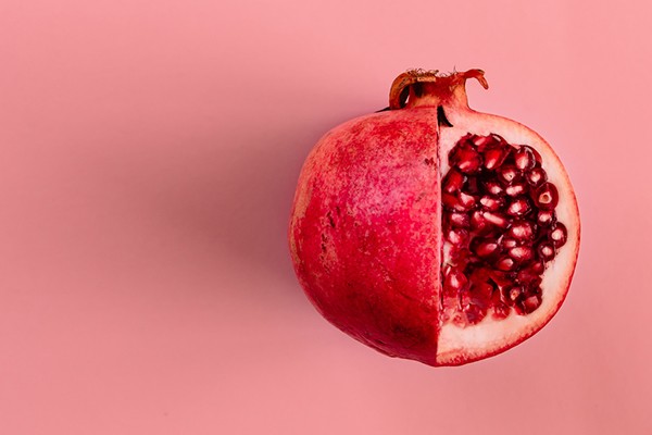 assortment of colorful fruits and vegetables on a wooden surface