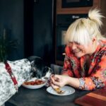 dog eating apple