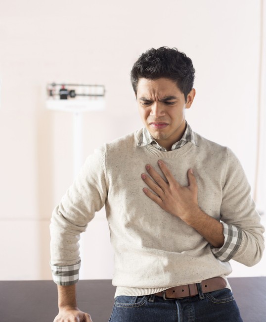 Young man heartburn